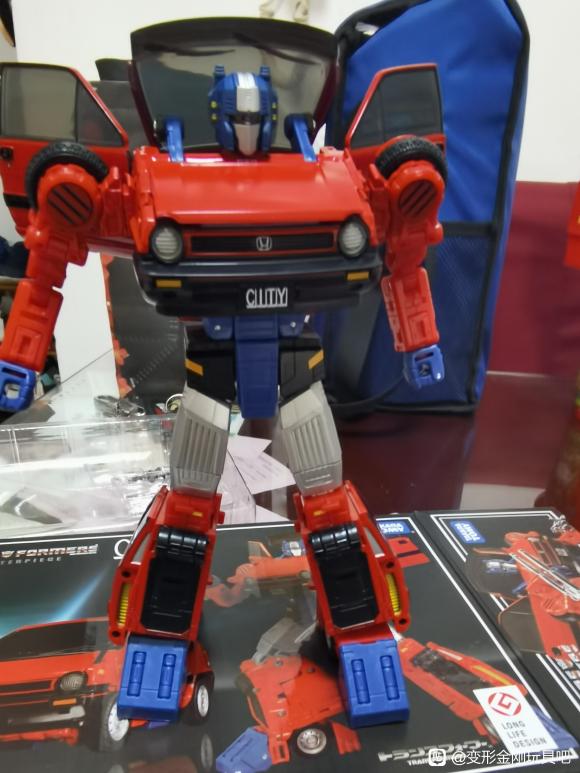 Transformers Masterpiece MP-54 Reboost In-Hand Box & Figure Images